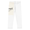 White leggings with a beige panel featuring text on a white background