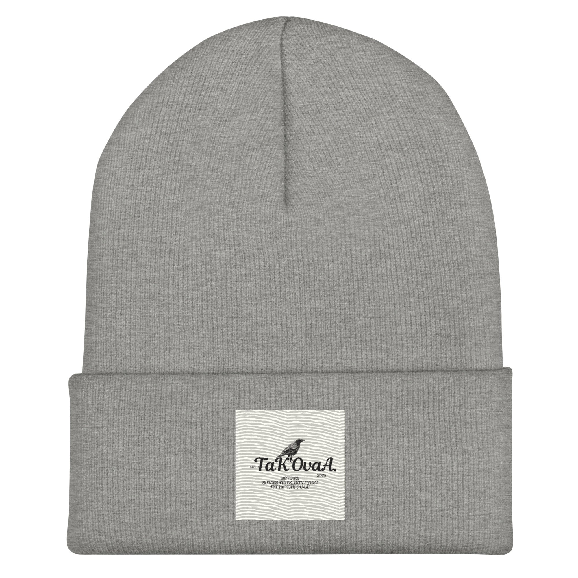 Gray beanie with a white label on a white background