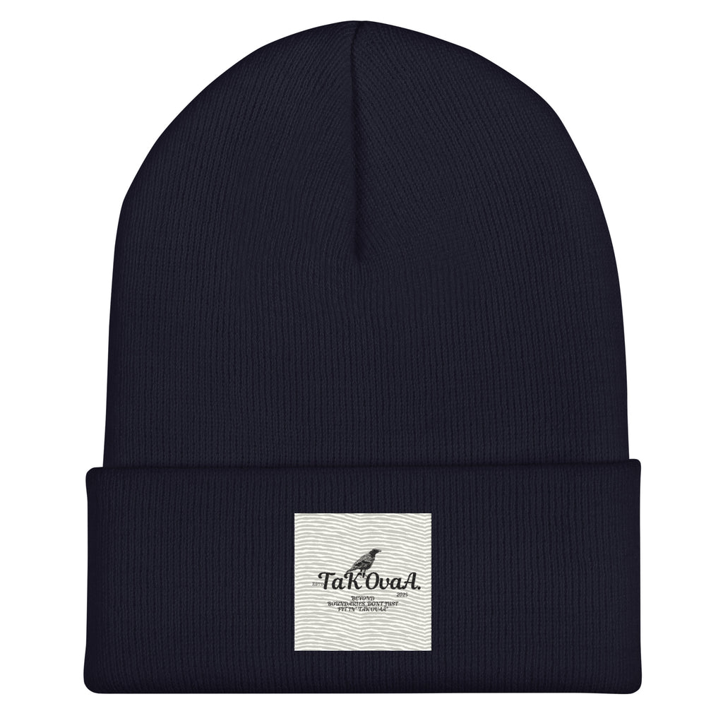 Black beanie with a white label on a white background