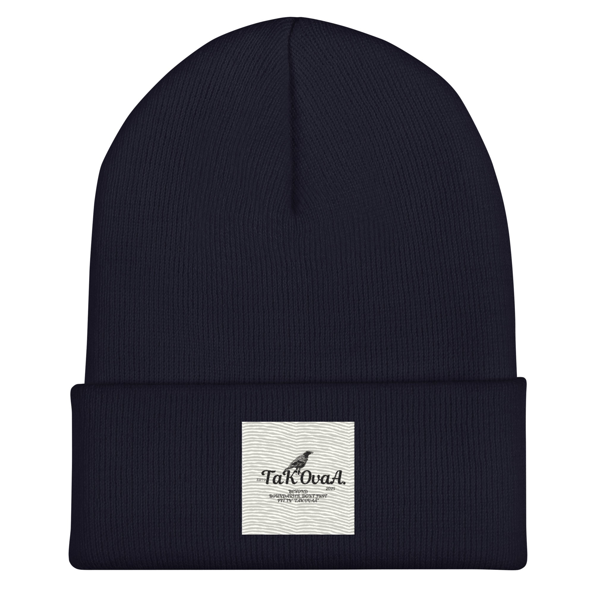 Black beanie with a white label on a white background
