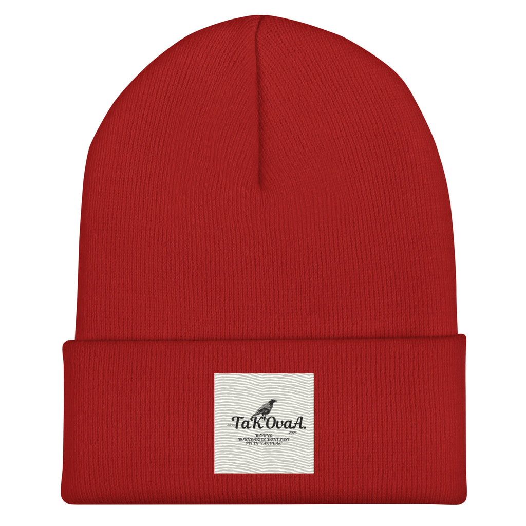 Red beanie with a white label on a white background