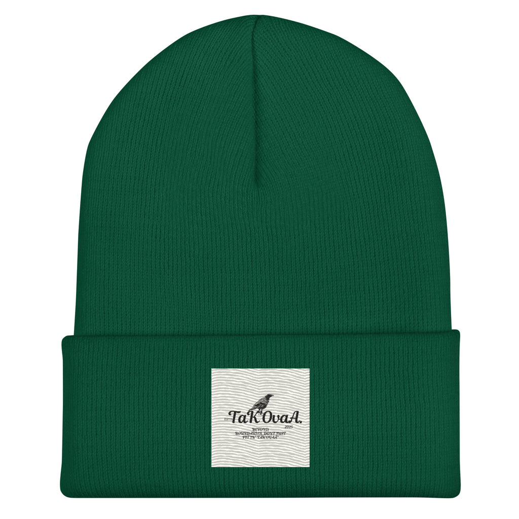 Green beanie with a white label on a white background