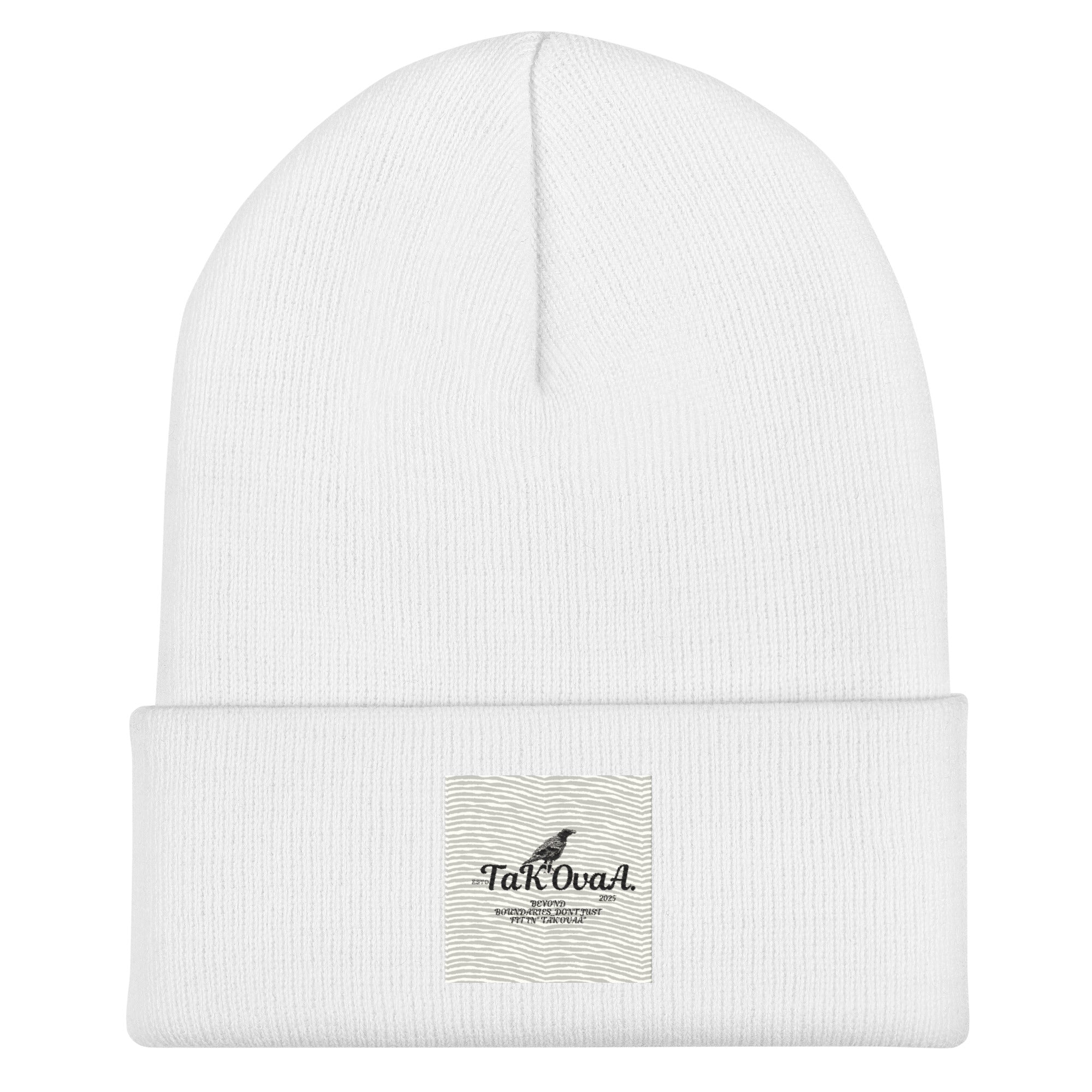 White beanie with a patch featuring 'Takova' branding on a white background