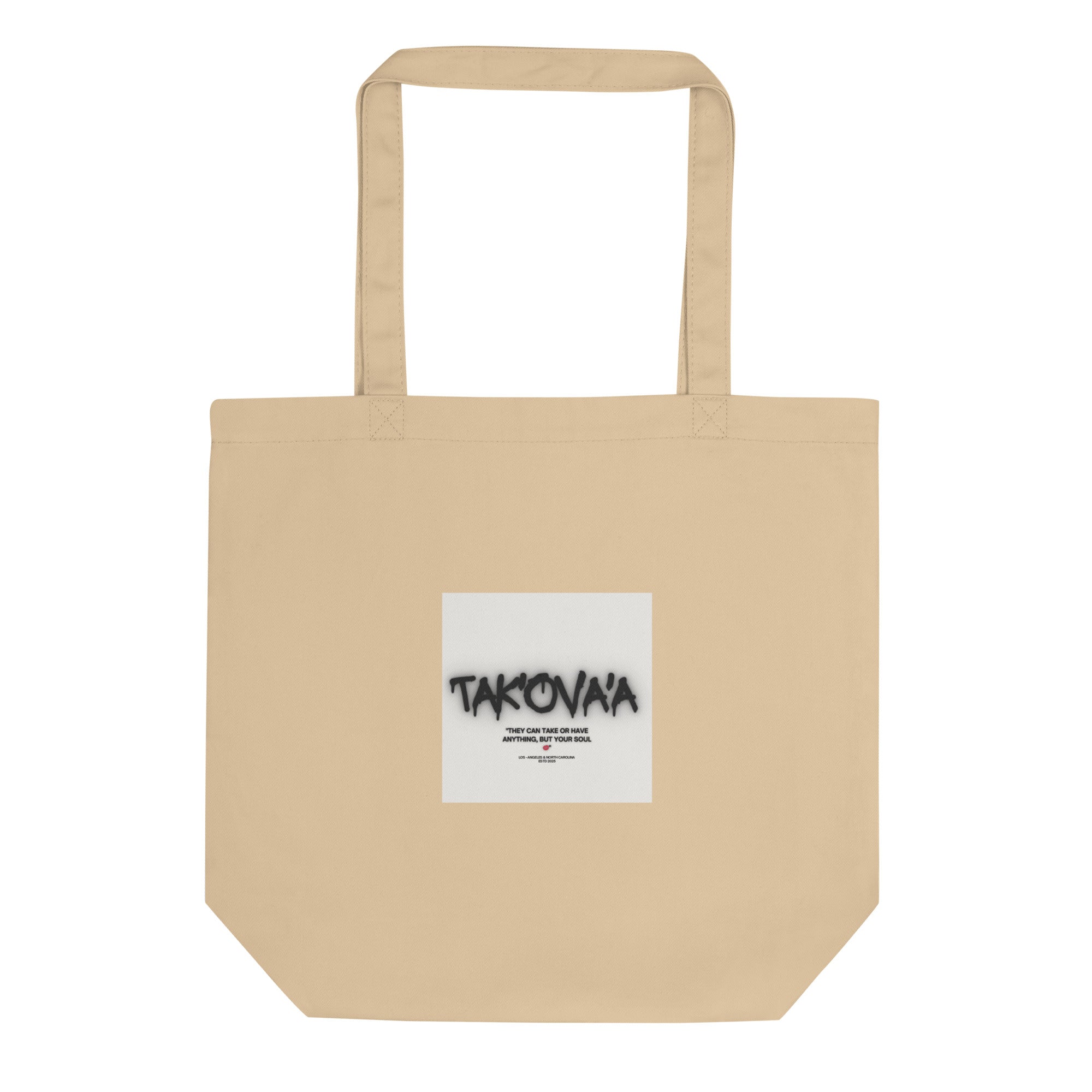Beige tote bag with a white label featuring 'Takovaa' on a white background