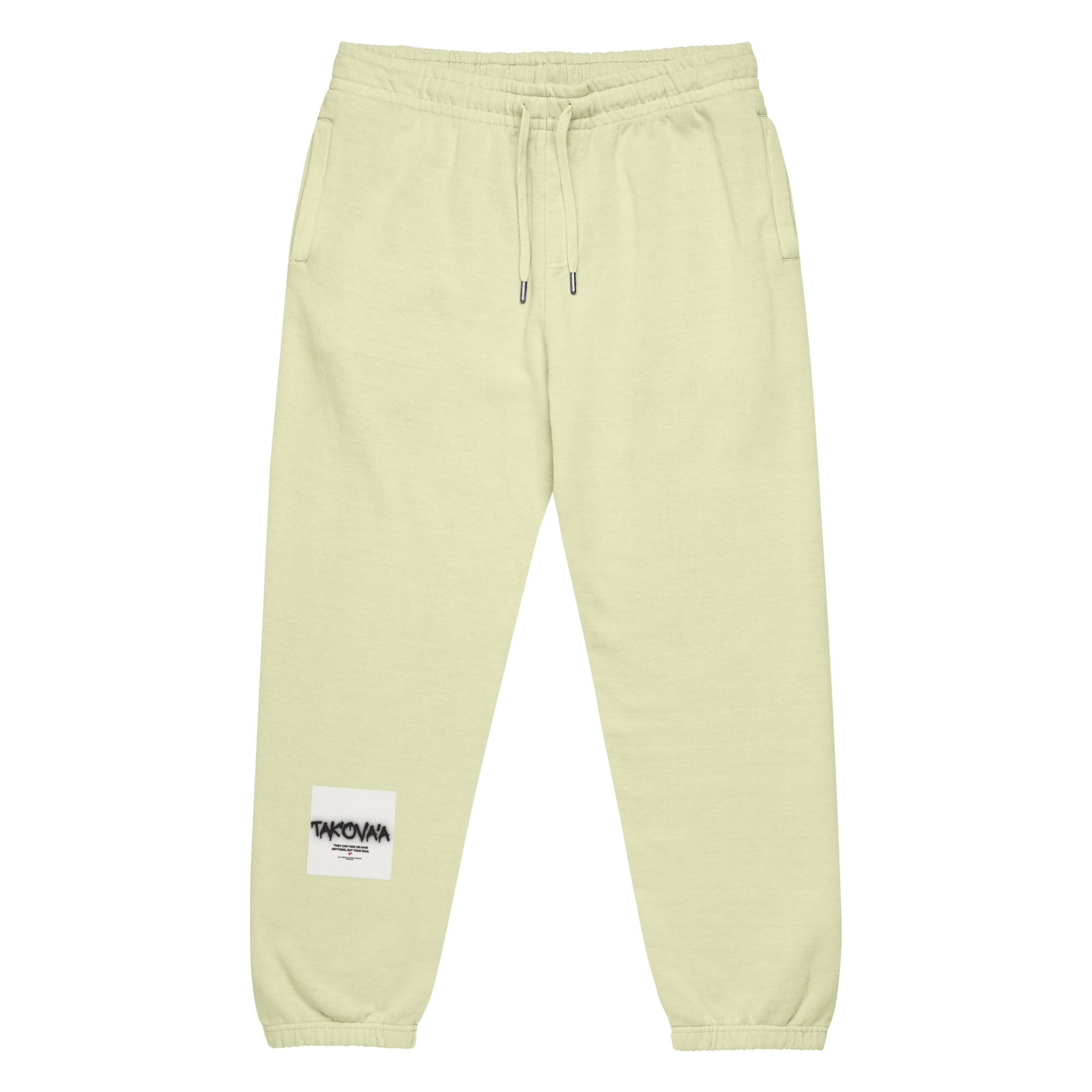 Light green sweatpants with a brand label on a white background