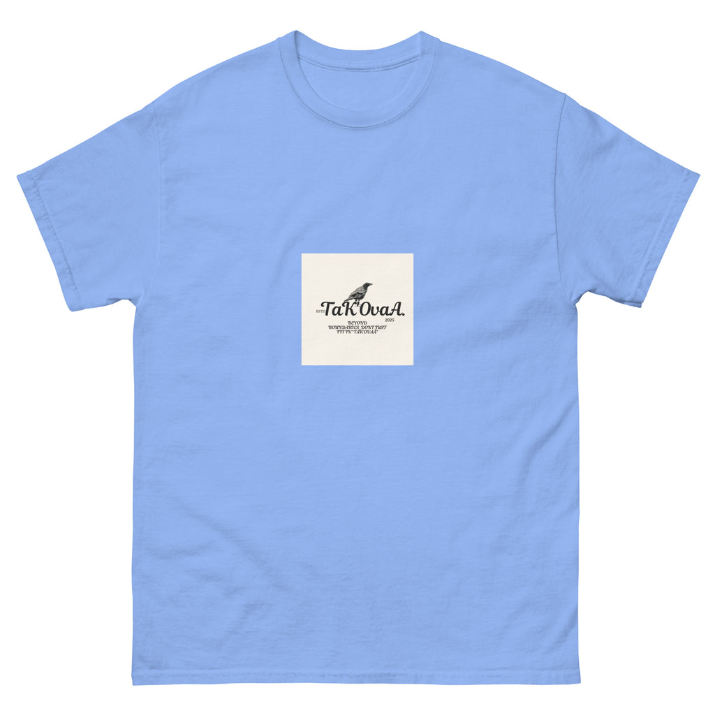 Light blue t-shirt with a small white square featuring text and a logo on a white background