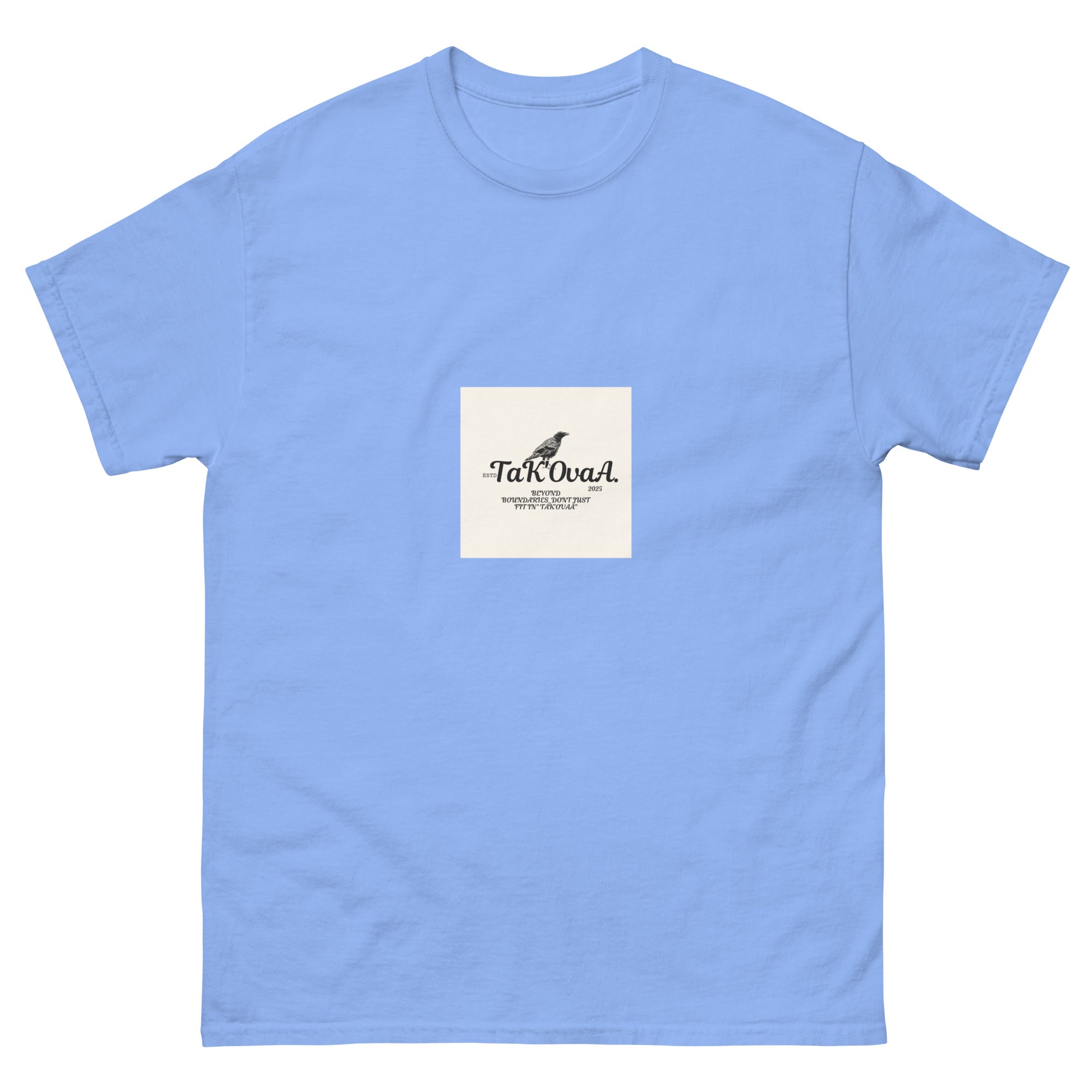 Light blue t-shirt with a small white square featuring text and a logo on a white background