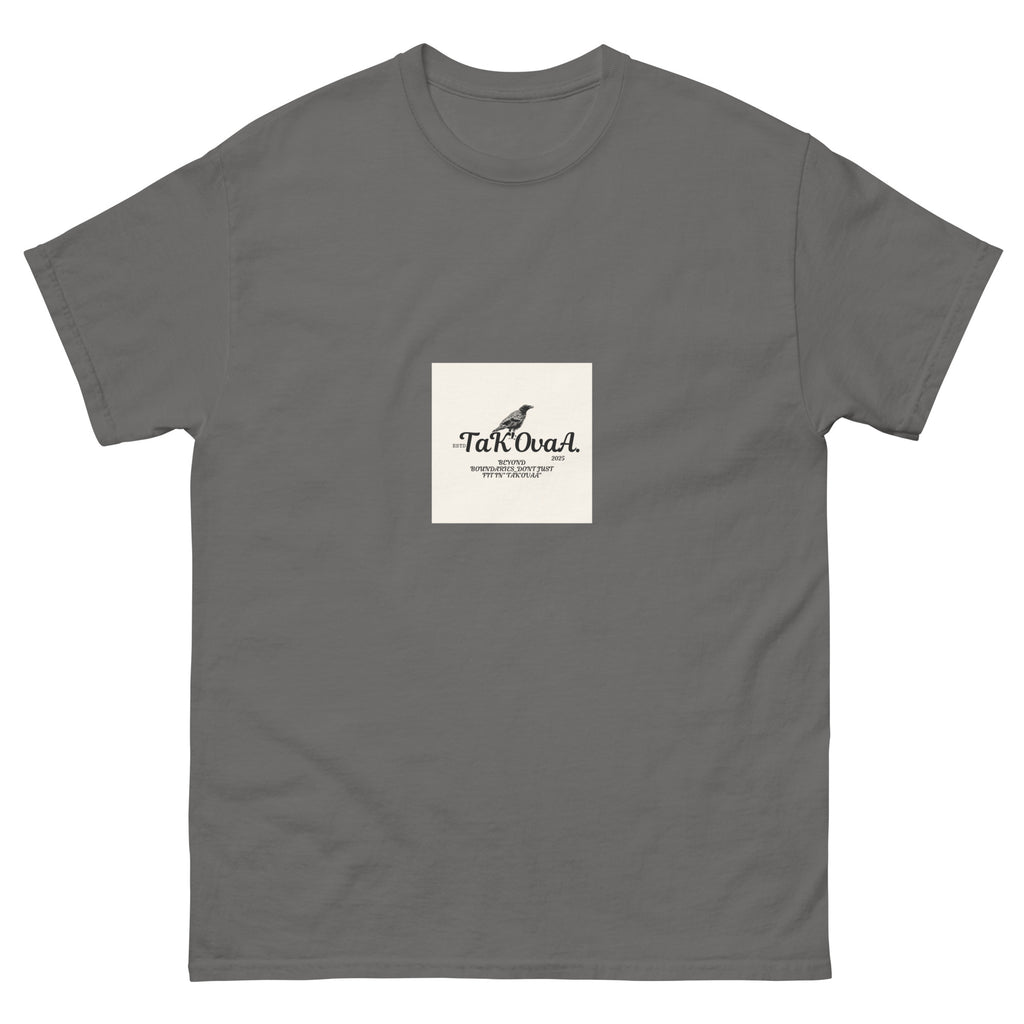 Gray t-shirt with a small white square featuring text and a logo on a white background