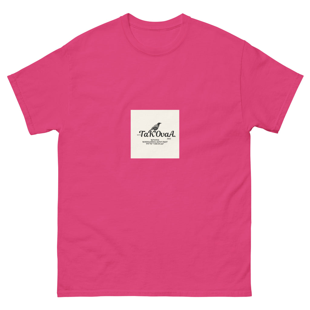 Pink t-shirt with a small white label featuring text and a logo on a white background