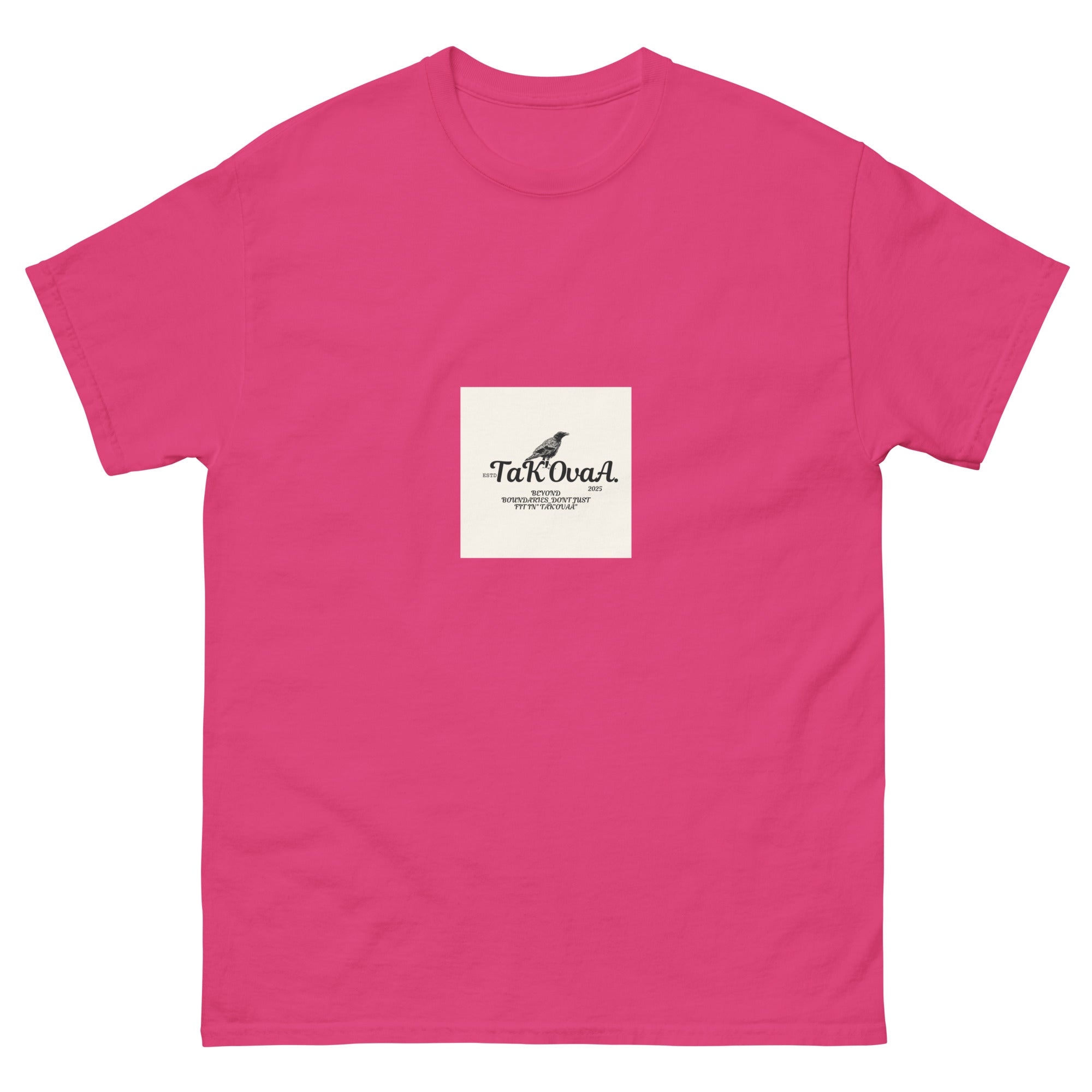 Pink t-shirt with a small white label featuring text and a logo on a white background