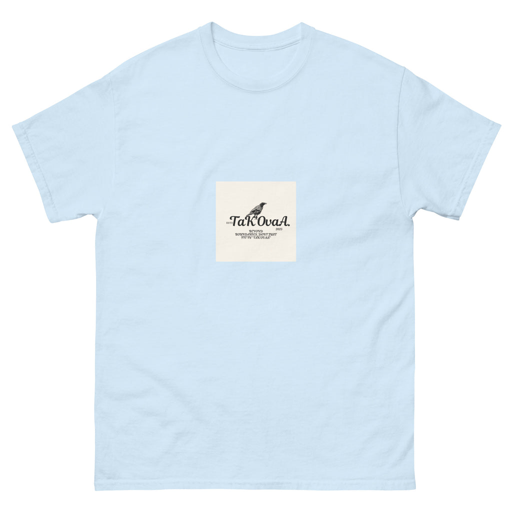 Light blue t-shirt with a small square logo on a white background