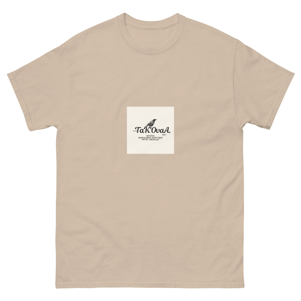 Beige t-shirt with a white square logo featuring text and a graphic on a white background