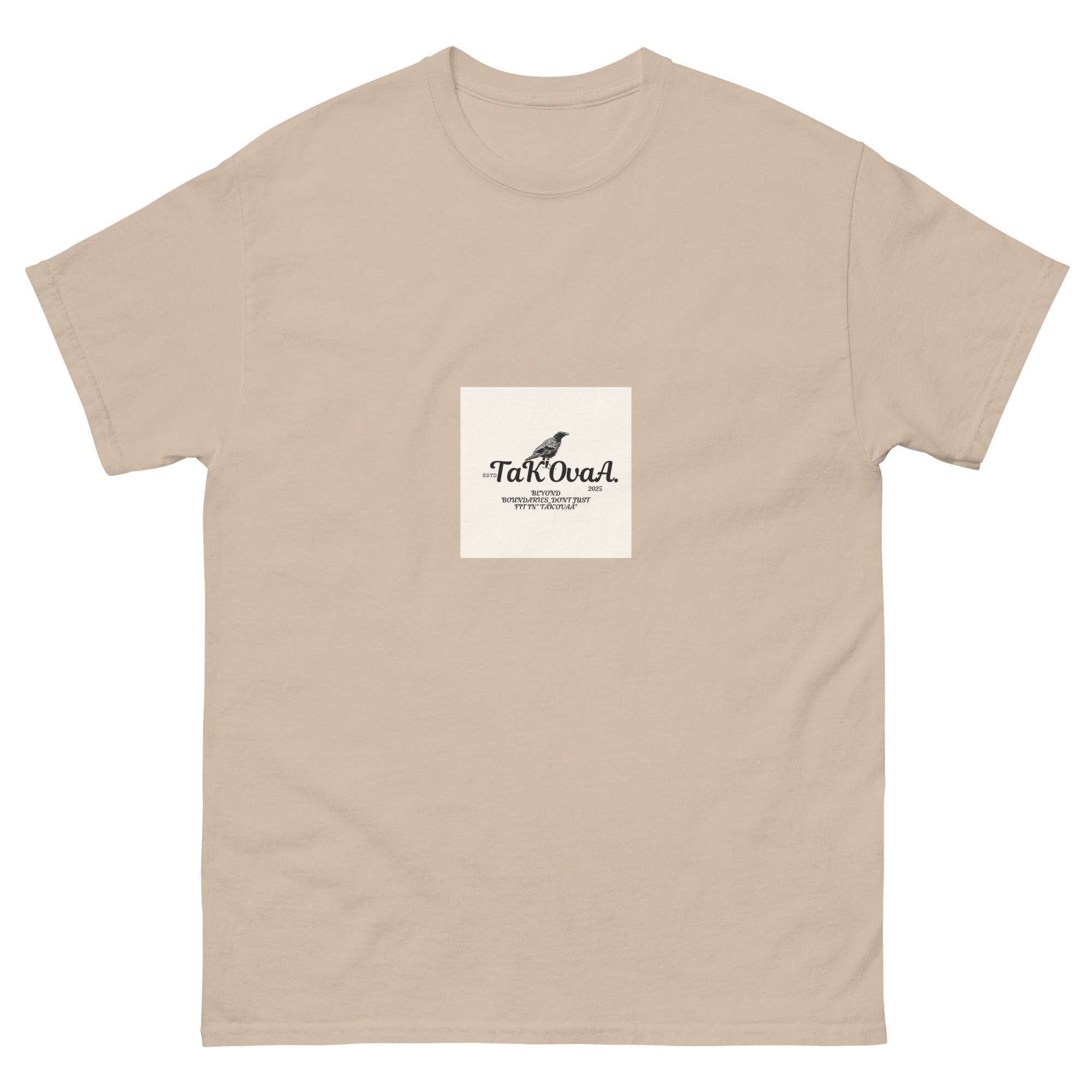 Beige t-shirt with a white square logo featuring text and a graphic on a white background