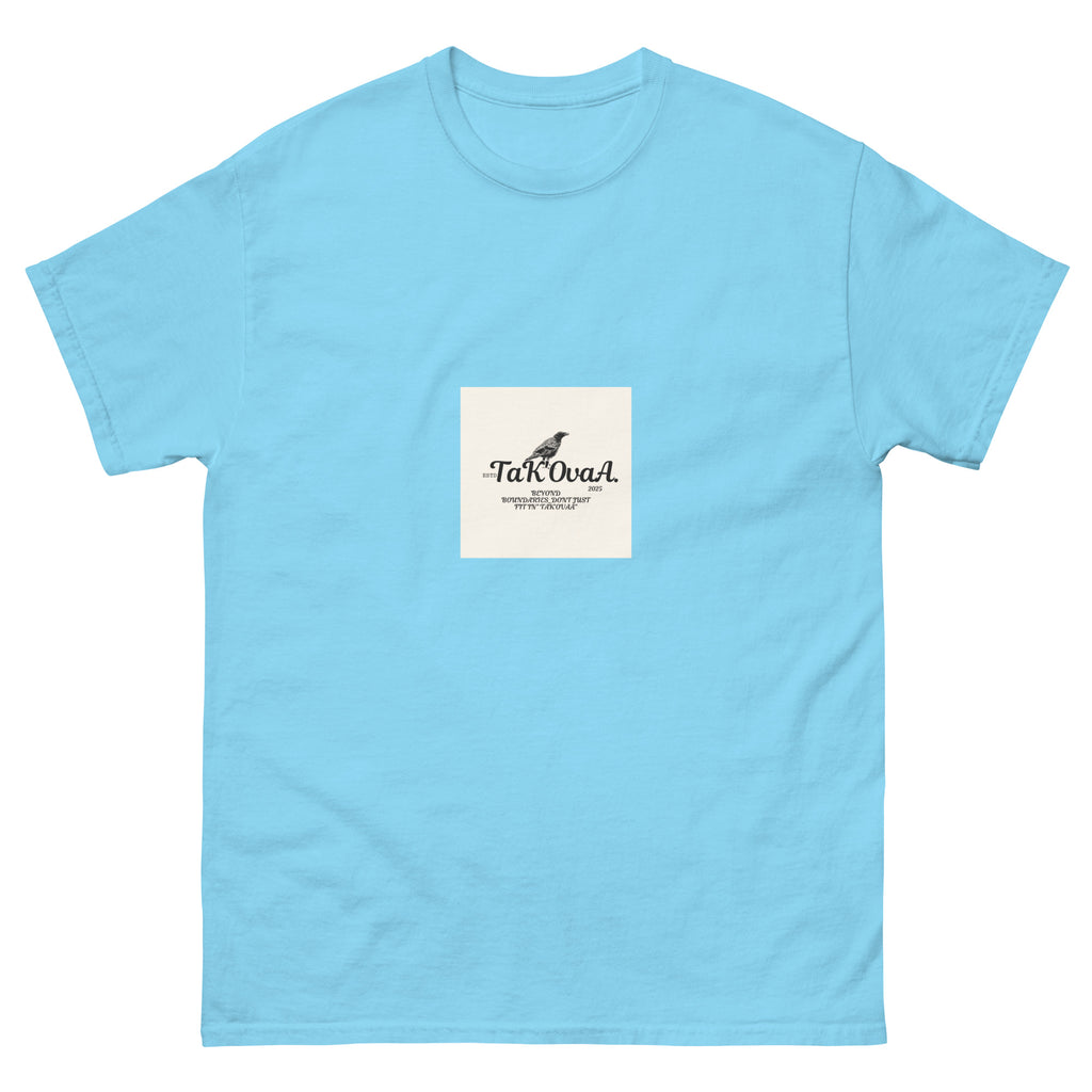 Light blue t-shirt with a small white square logo featuring text and a graphic on a white background
