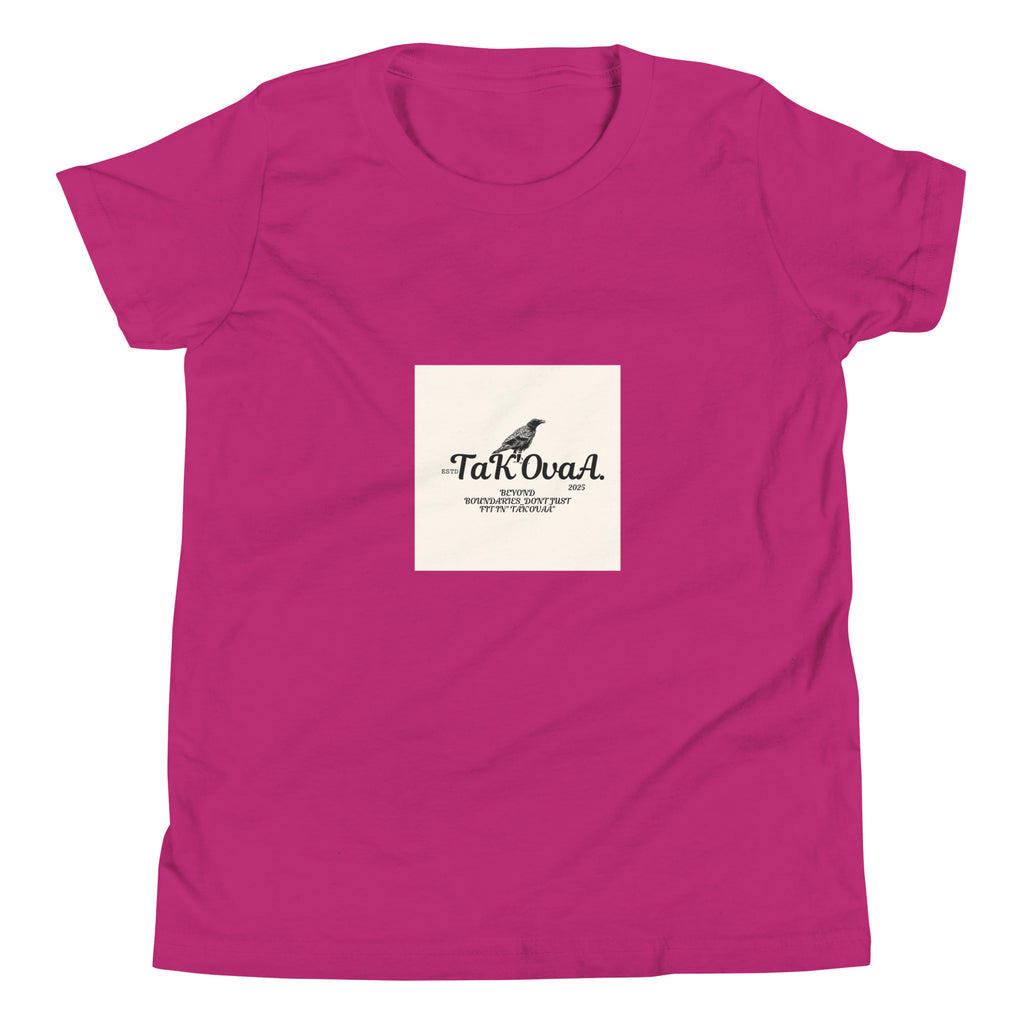Pink t-shirt with a white square featuring text and a logo on a white background
