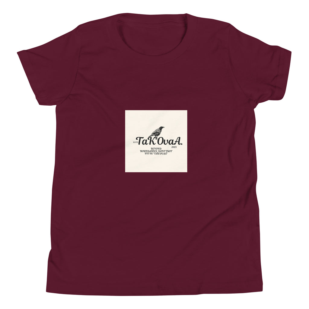 Maroon t-shirt with a white square featuring text and a logo on a white background